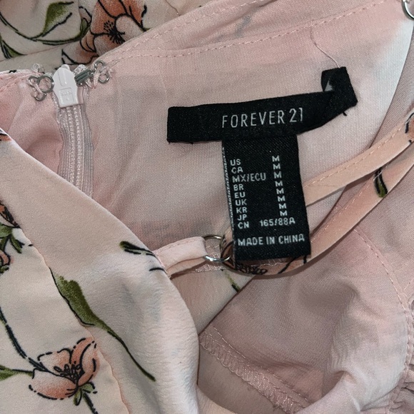 Baby Pink Floral Romper with adjustable cross back straps - Picture 6 of 7